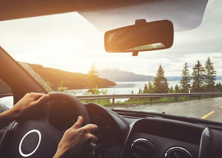 Man driving a rental car in Europe