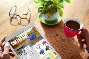Searching for car hire on a tablet