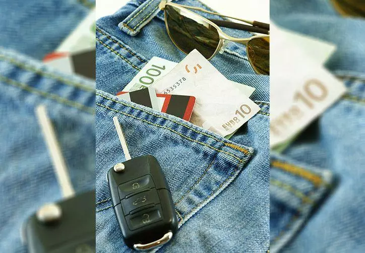Rental car key and Euros in jeans pocket.