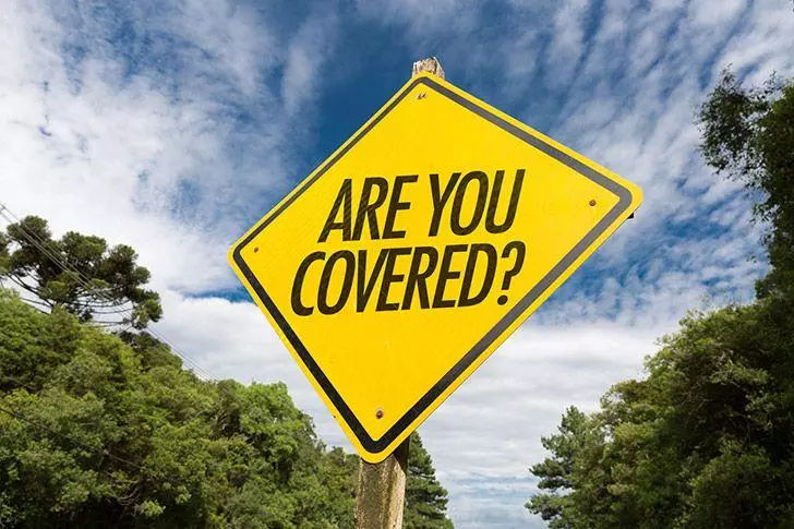 Road sign saying are you covered