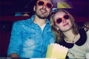 Couple watching a movie in the cinema 